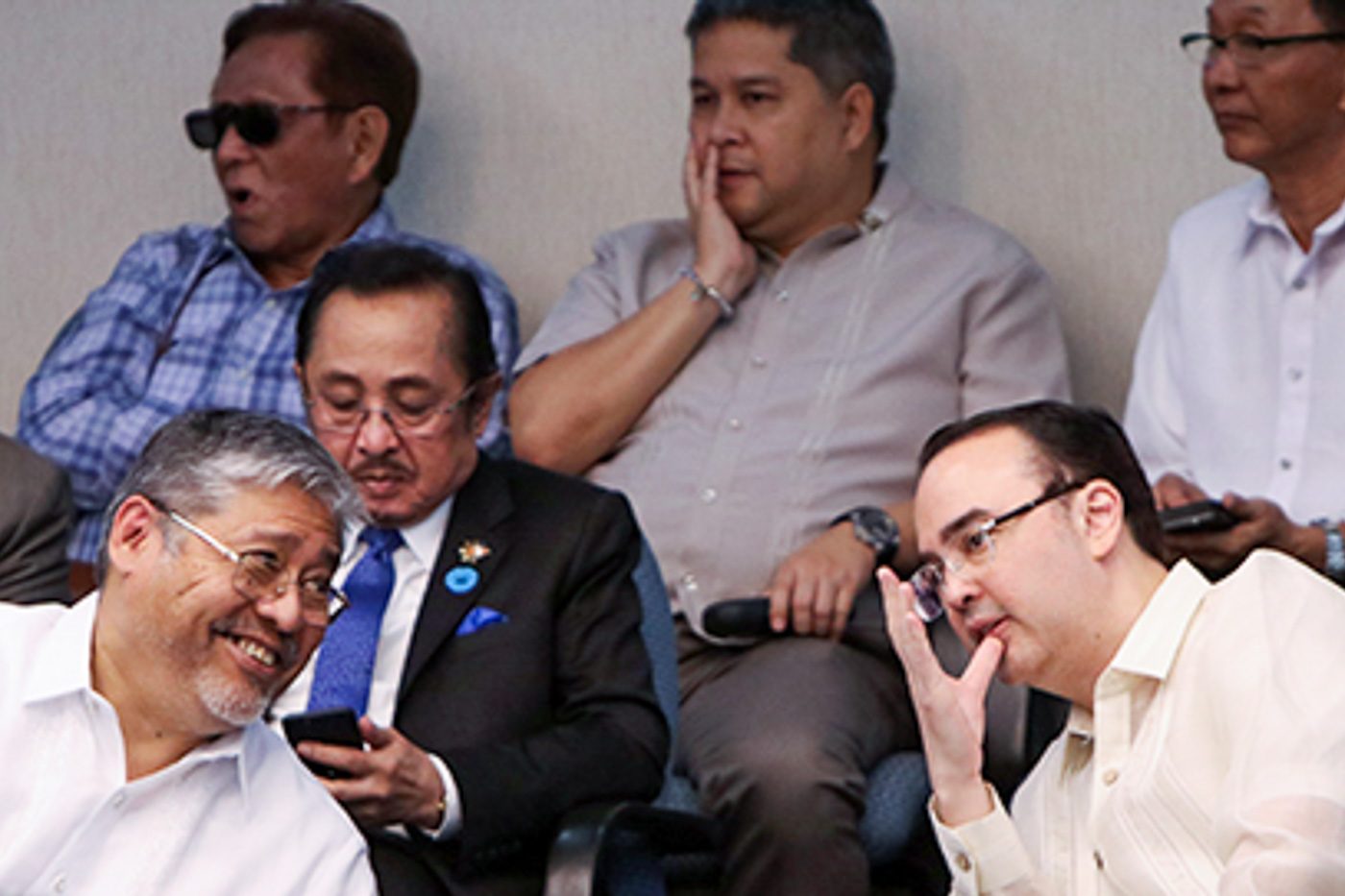 CHANGING OF THE GUARDS. After his confirmation on May 17, 2017, Senator Alan Peter Cayetano (right) shares a light moment with veteran career diplomat Enrique Manalo (left), who served as DFA chief in an acting capacity. Photo by Lito Boras/Rappler   