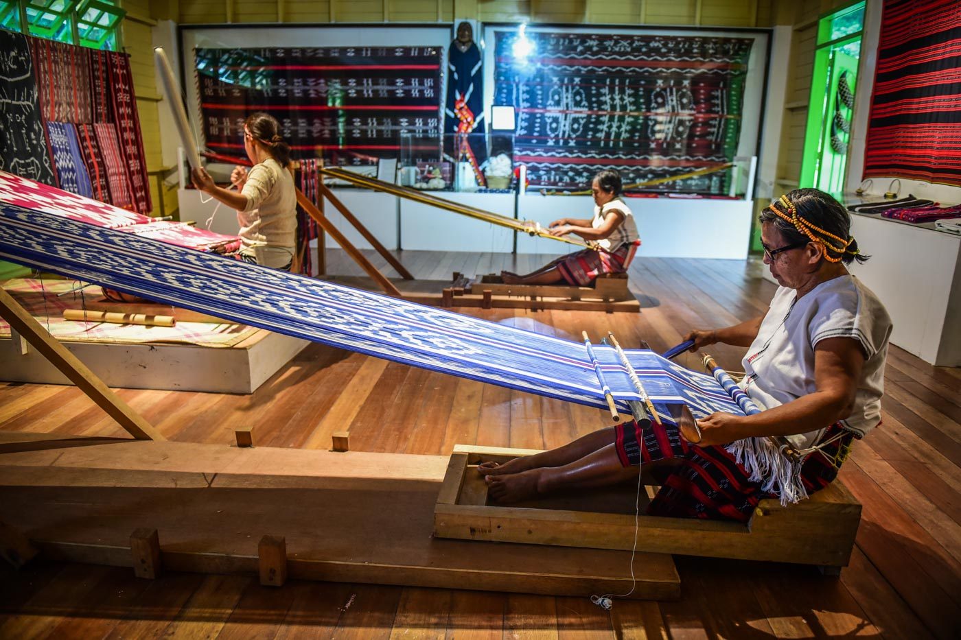 FLOOR LOOM. Weavers at the Ifugao Heritage School work on weaves using the floor loom 
