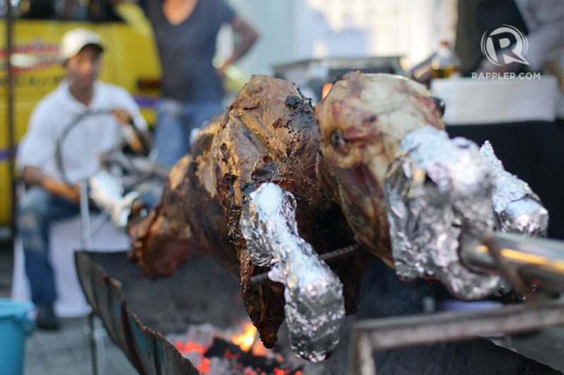 Chefs Nino Laus and Tristan Encarnacion had their calf roasted right outside their truck