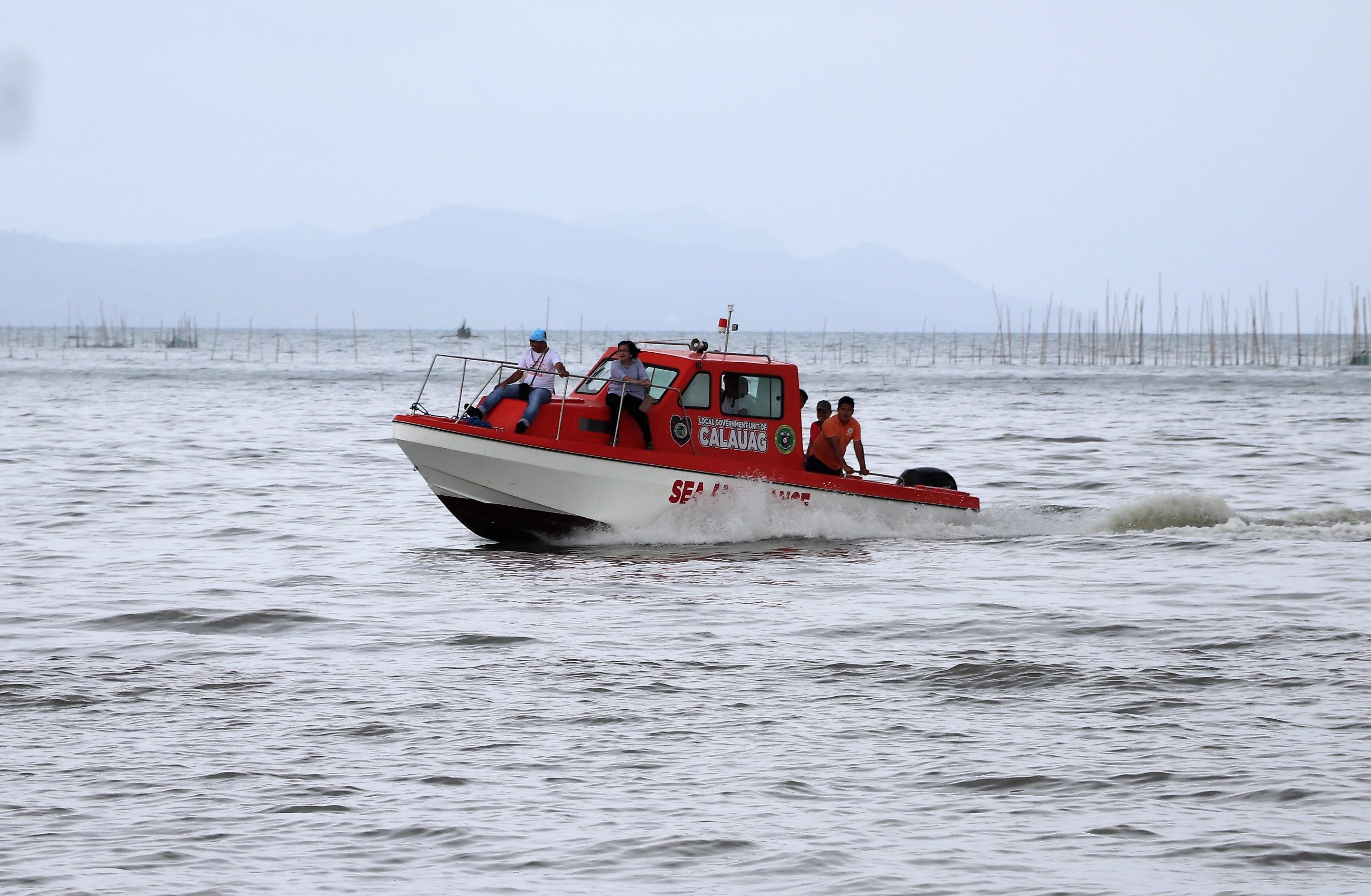 TEST RUN. Health staff from the municipality of Calauag, Quezon take the new sea ambulance for a test run after its blessing and turn-over. Photo from DOH-CALABARZON  