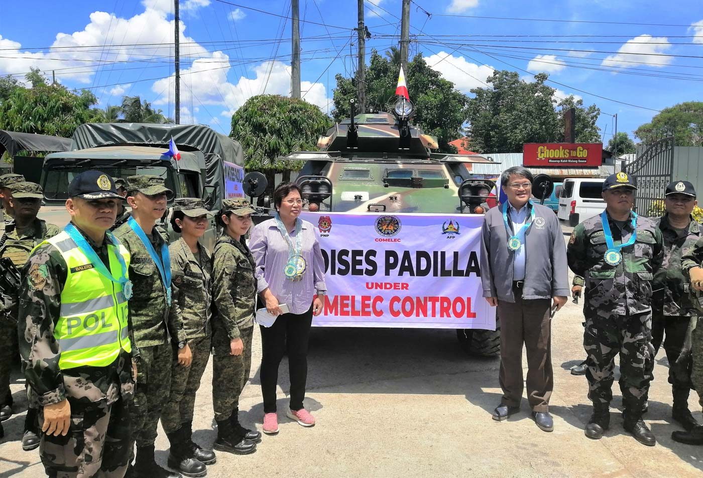 COMELEC commissioners Antonio Kho (3rd from right) and Rowena Guanzon (4th from right) declare Moises Padilla under its control on May 6, 2019, with Negros Occidental police director Col. Romeo Baleros (left) and Army 303rd Infantry Brigade commander Brig. Gen. Benedict Arevalo (2nd from left). Contributed photo 