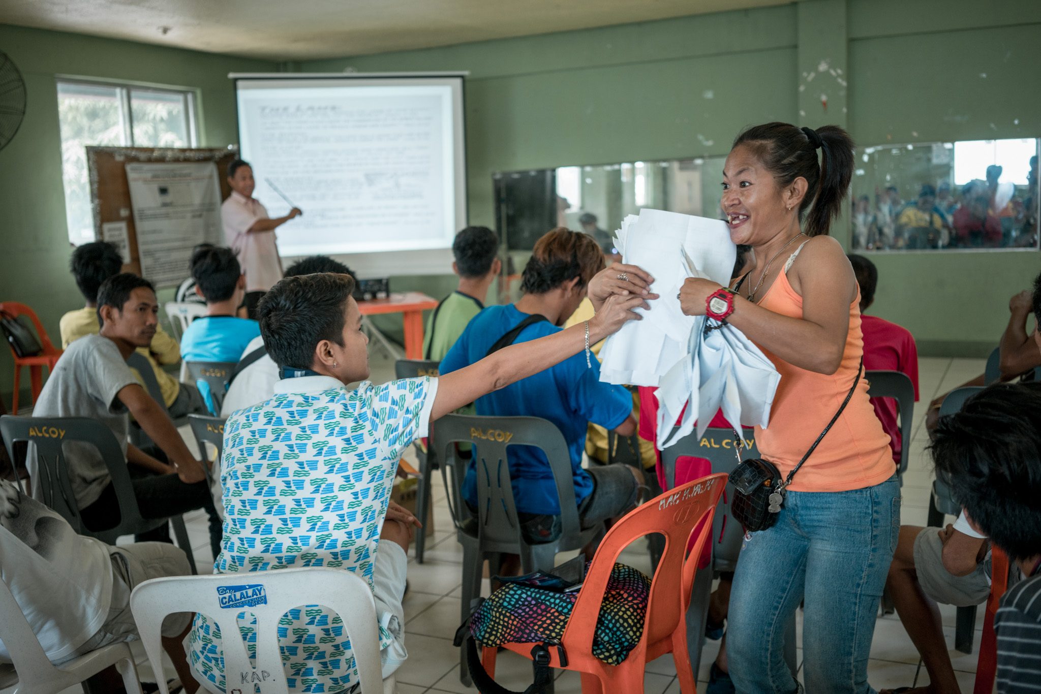 VOLUNTEER. Though not tagged in the police drug list, Jennylyn attends Saturday sessions with her husband. She volunteers for tasks to help Renato, like collecting attendance sheets.  