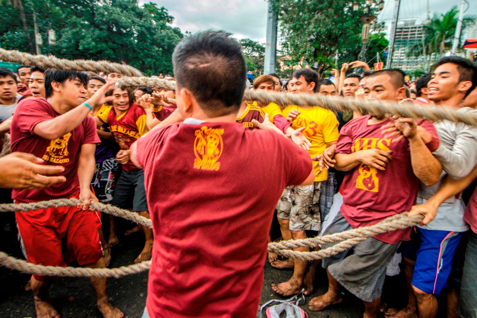 PRECAUTION. Devotees of the Black Nazarene trying to untangle the rope and preventing accidents.  