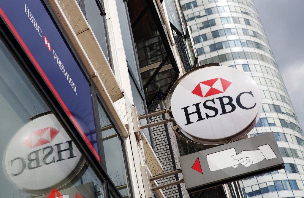 HSBC profits halved as virus batters global economy