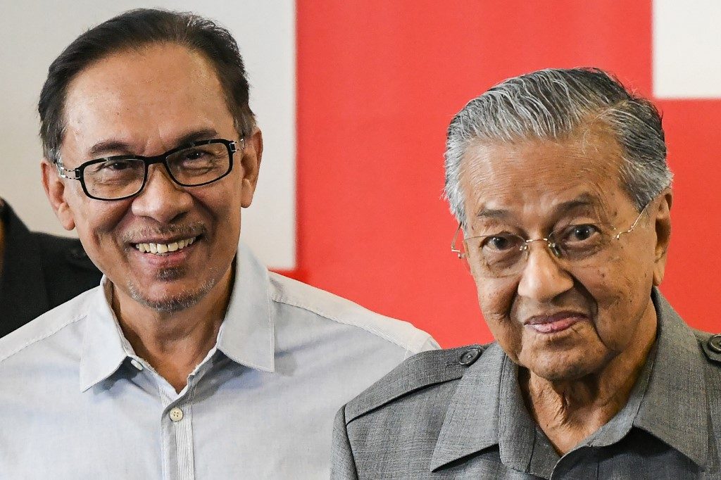 Malaysia’s Mahathir, Anwar ally again amid crisis