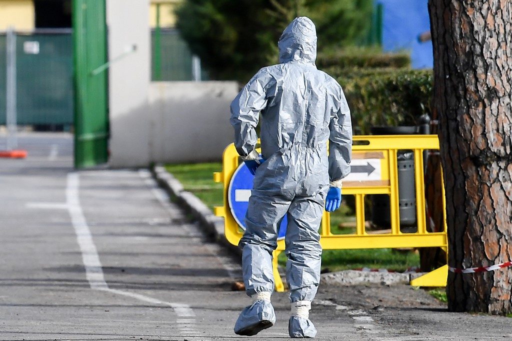Italy towns under lockdown as first European coronavirus death reported