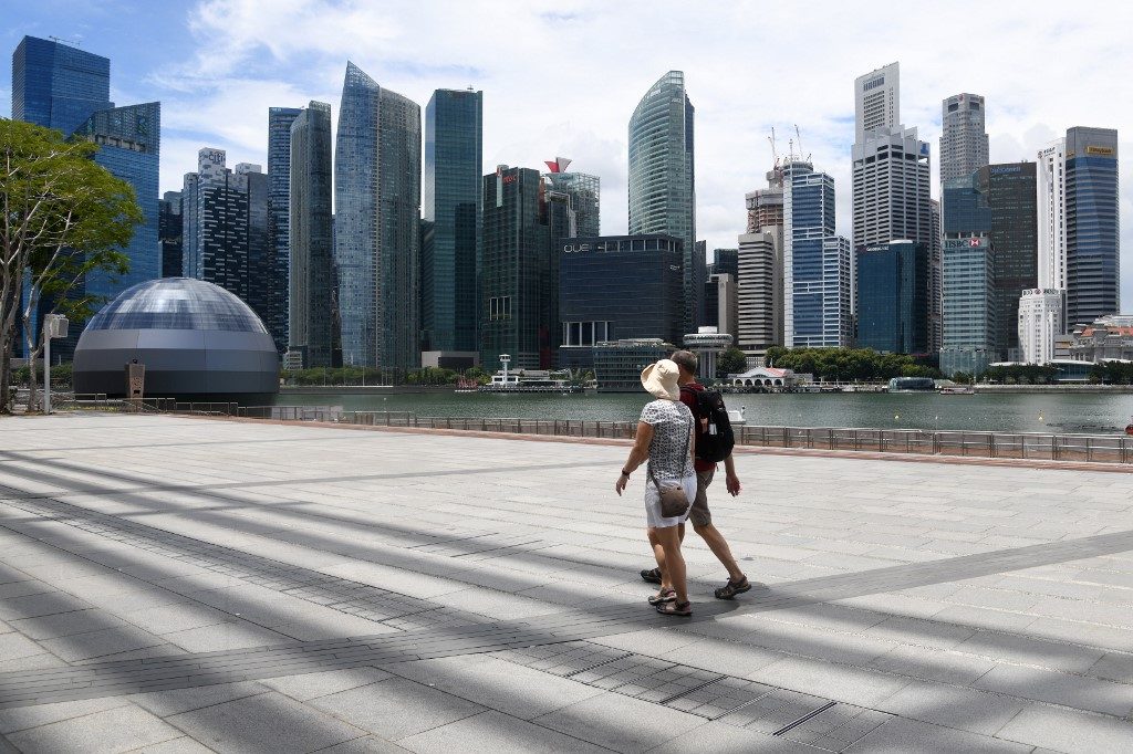 Singapore to close most workplaces, shift to online classes