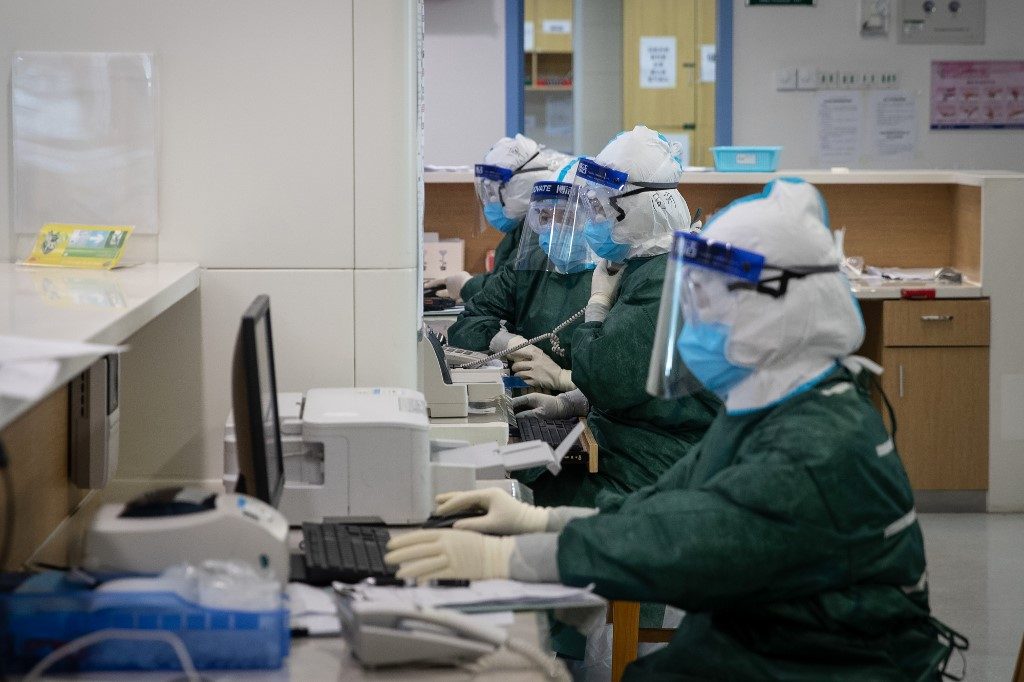 China reports 27 new virus deaths, lowest rise in cases since January