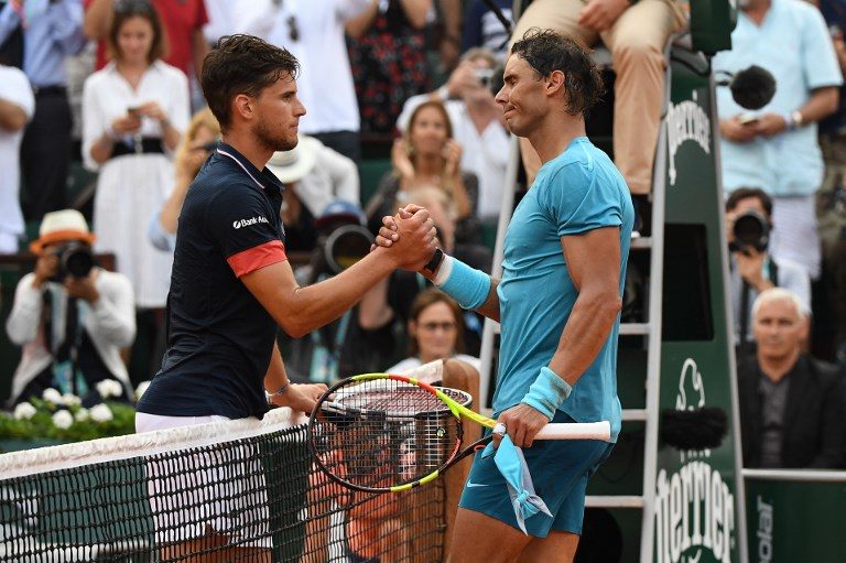 IDOL. Austria's Dominic Thiem (left) congratulates men's singles champion Rafael Nadal. Photo by Christophe Archambault/AFP 