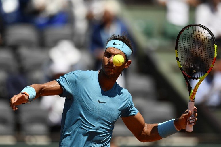 Nadal opens French Open title defense with easy victory