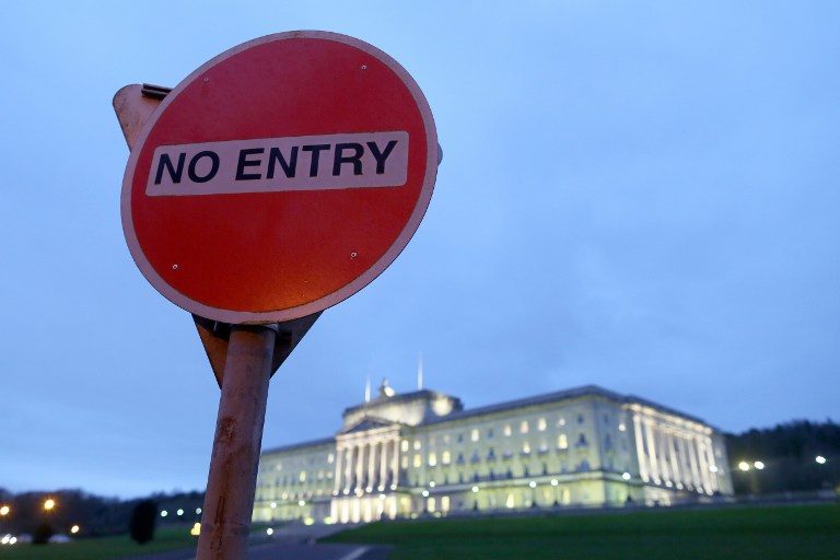 A 'No Entry' sign is pictured in front of the Parliament Buildings, Stormont in Belfast on January 16, 2017. Paul Faith/AFP 