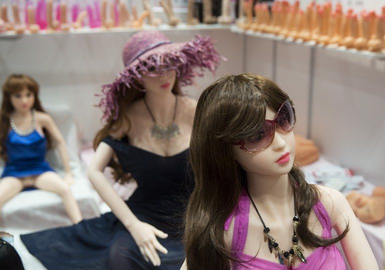 A stall has on display life like dolls and sex toys at the Adult Asia Expo in Hong Kong on August 29, 2016. File photo by Isaac Lawrence/AFP  