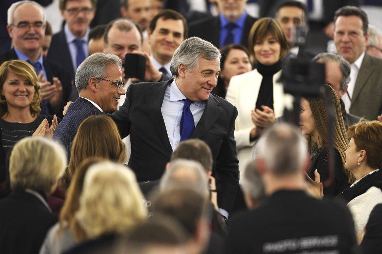 The European Parliament's new President Antonio Tajani (C) is congratulate by members of European Parliament following his election in Strasbourg, eastern France, on January 17, 2017. Frederick Florin/AFP 