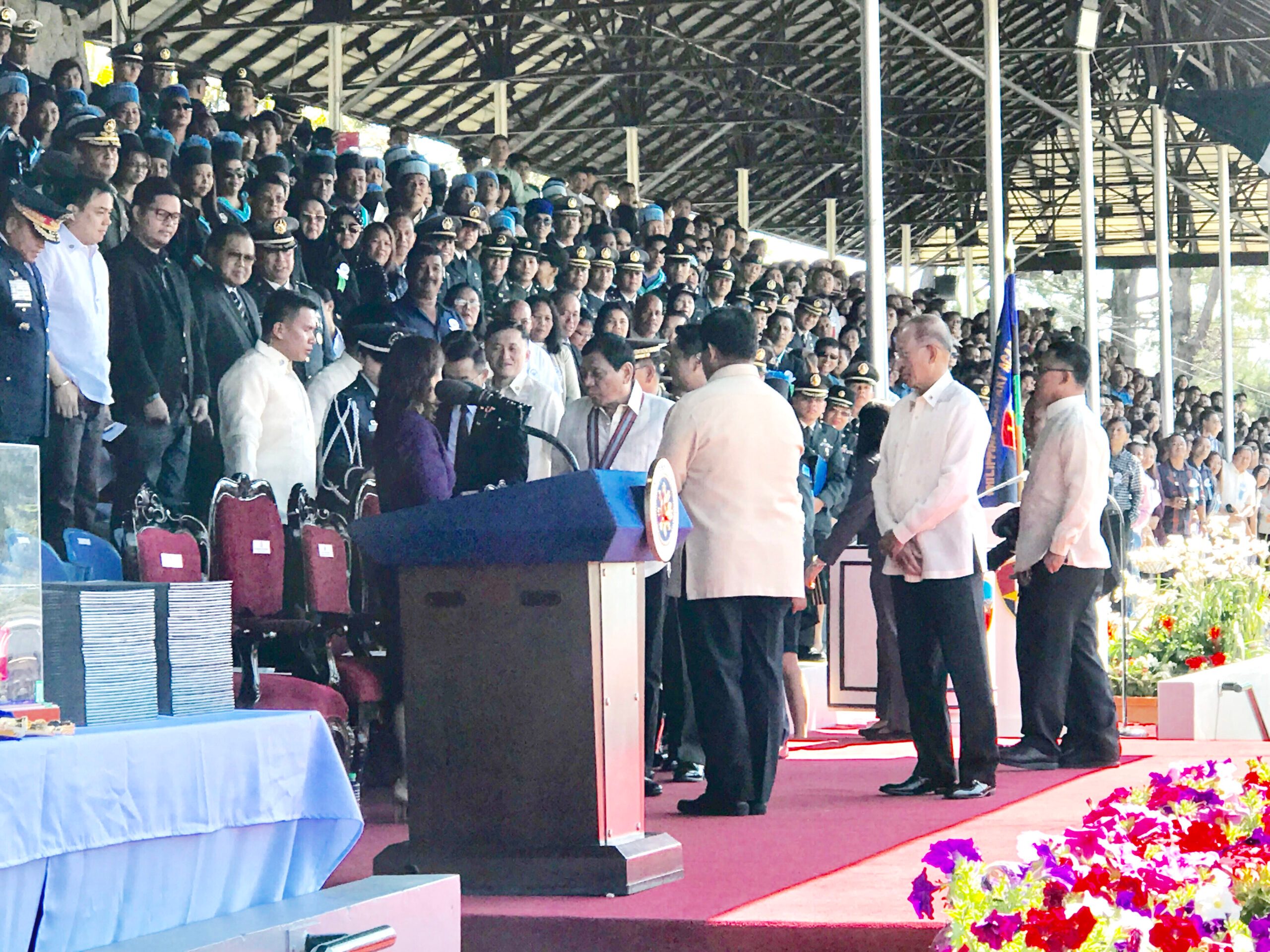 At PMA graduation, Lorenzana sits between Duterte, Robredo