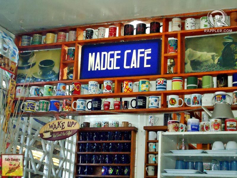 MADGE’S MUGS. Loyal customers have their own mugs with their first names on it. Iced coffee may be served in a tin can. Photo by Antoine Greg Flores
