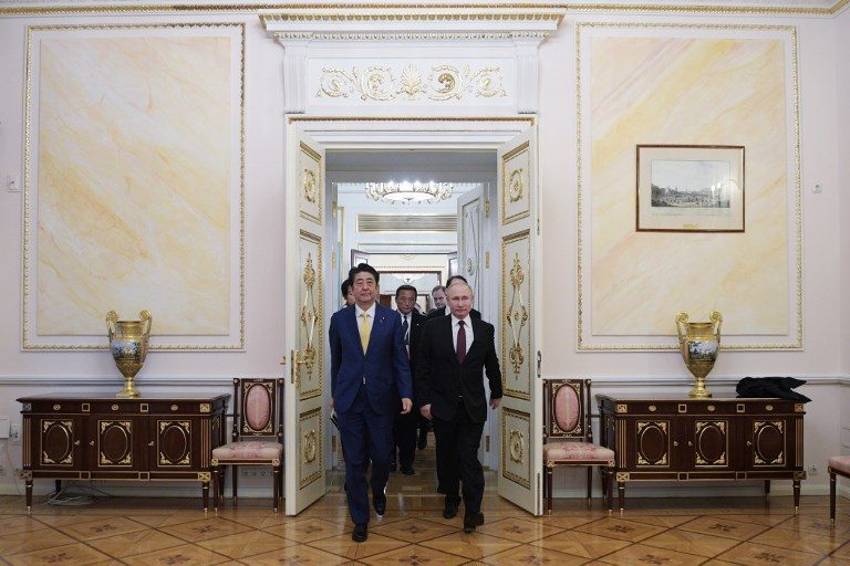 Putin, Abe hold summit to break island impasse