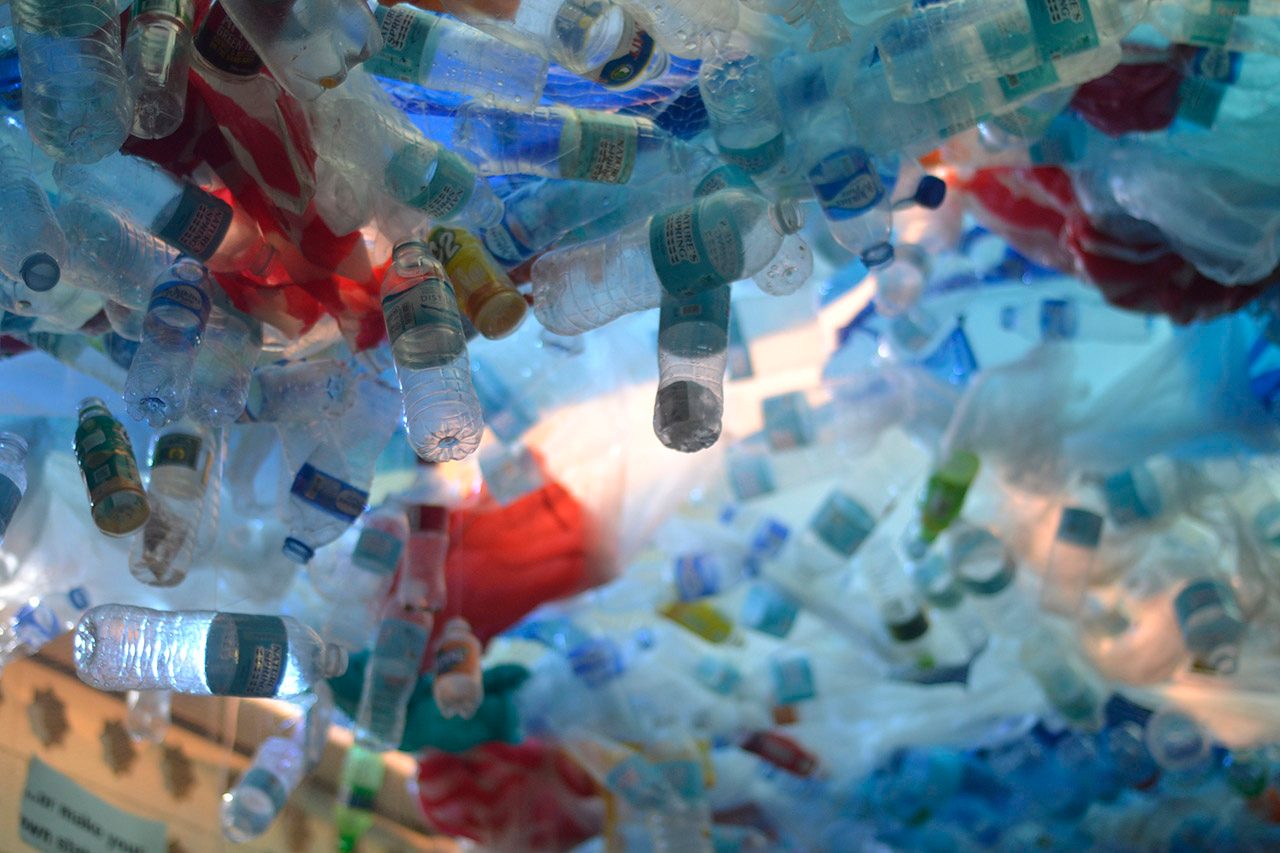 RECYCLED. Plastic bottles, sando bags, and other single-use plastics hang from the Science Center's ceiling to simulate the suffocation of marine life. Photo from McKeough Marine Center  