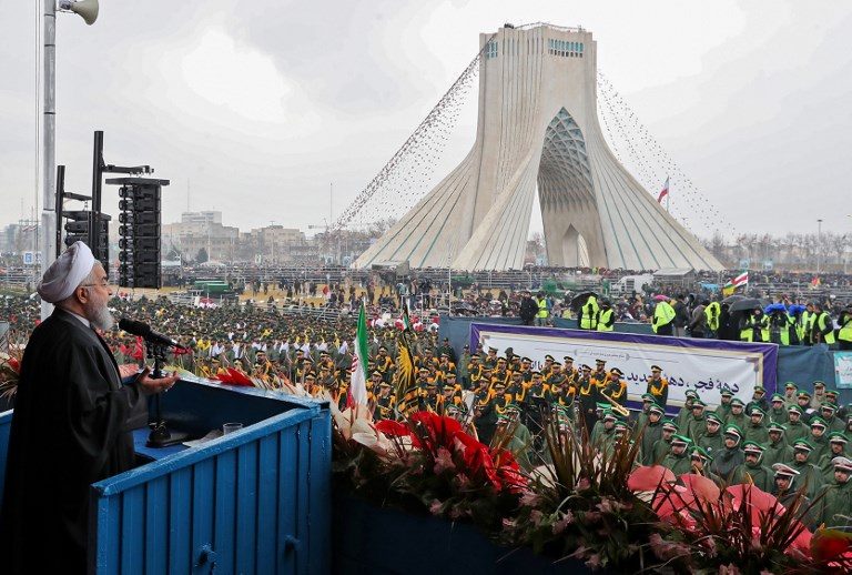 40 YEARS AFTER. Iranian President Hassan Rouhani addressing crowds during a ceremony celebrating the 40th anniversary of Islamic Revolution in the capital Tehran's Azadi (Freedom) square on February 11, 2019. Photo by HO/Iranian Presidency/AFP  