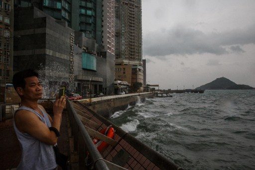 Hong Kong in lockdown as Typhoon Haima nears