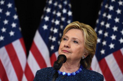 Clinton faces FBI probe as race enters final 10 days