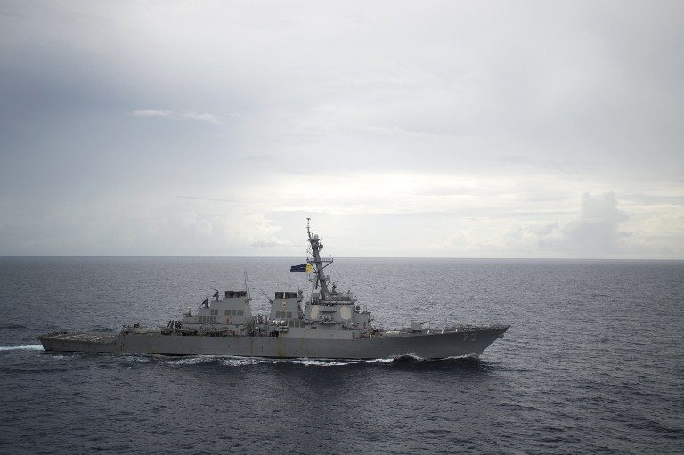 US destroyer sails close to contested islands in South China Sea
