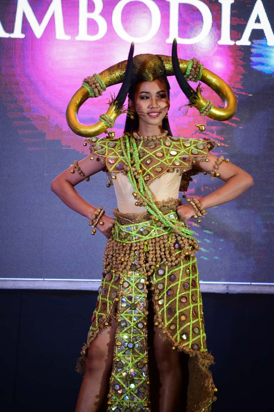 CAMBODIA. Em Kunthong in her national costume during the competition.   