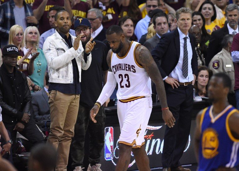 NOT ENOUGH. LeBron James walks off the court in the final seconds of the game as his best efforts to carry the Cavaliers were not enough to pull them through. TIMOTHY A. CLARY/EPA 