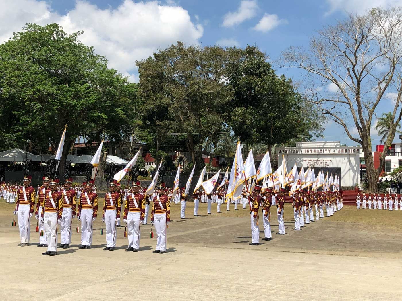 CEREMONY. PNPA cadets carry flags of each class at the PNPA alumni homecoming 2019. Photo by Sofia Tomacruz/Rappler 