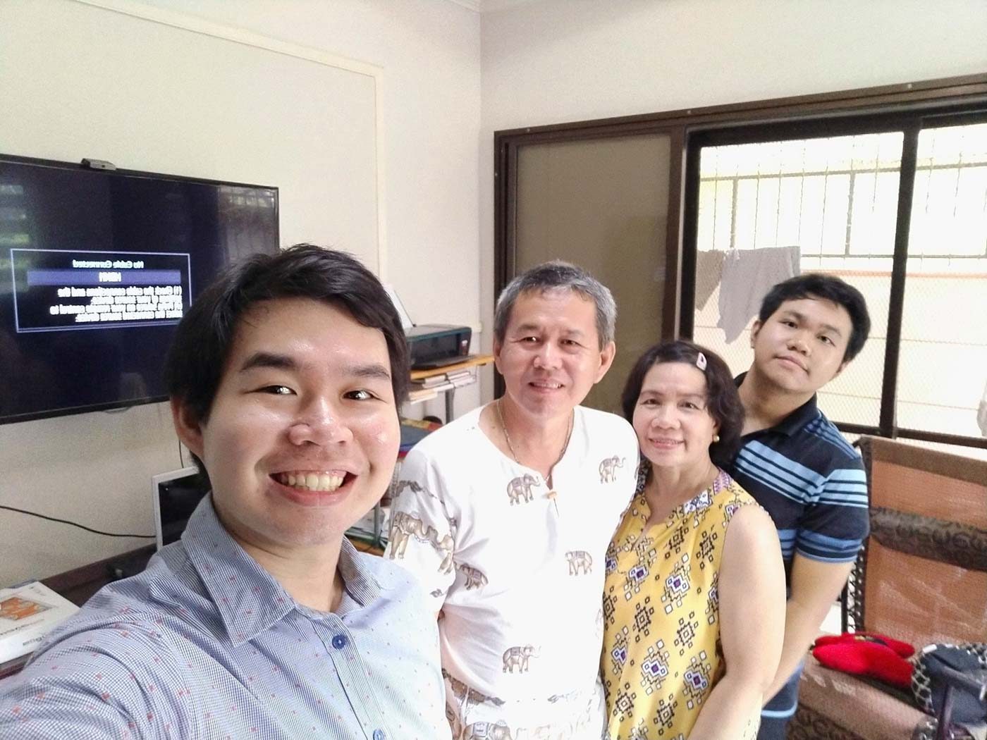 FAMILY. Jimeno poses for a photo together with her husband and two sons, both of whom are aspiring doctors. Photo courtesy of Jimeno