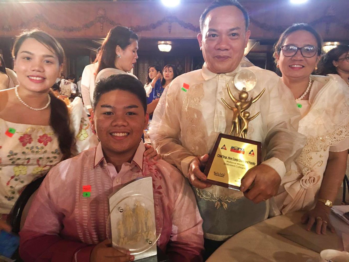 Model OFW families honored in Malacañang