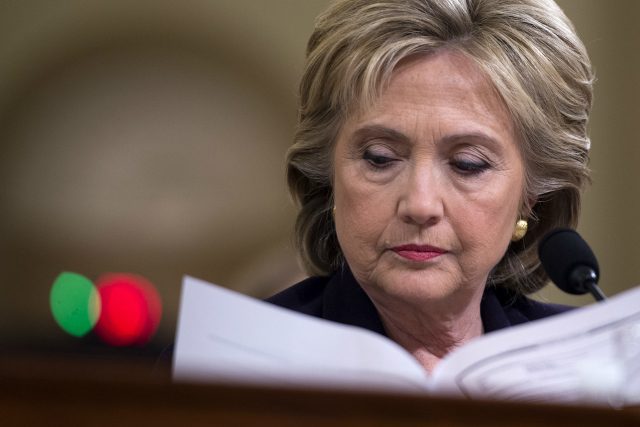 Clinton seeks to move past email controversy, directs blame at officials