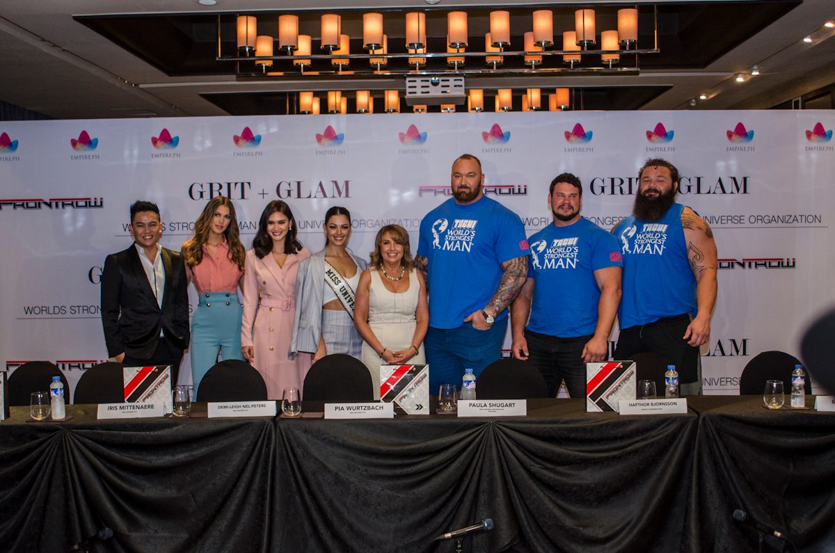 GRIT & GLAM. Frontrow's Sam Verzosa together with the Miss Universe beauty queens, Paula Shugart, and the winners of the World's Strongest Man after the press conference.  