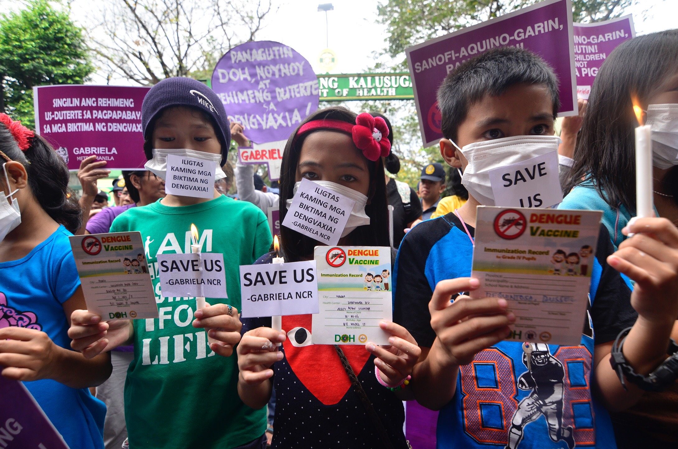 'SAVE US'. Children vaccinated with Dengvaxia join their parents and activists in a protest at the Department of Health in Manila on February 7, 2018. Photo by Maria Tan/Rappler  