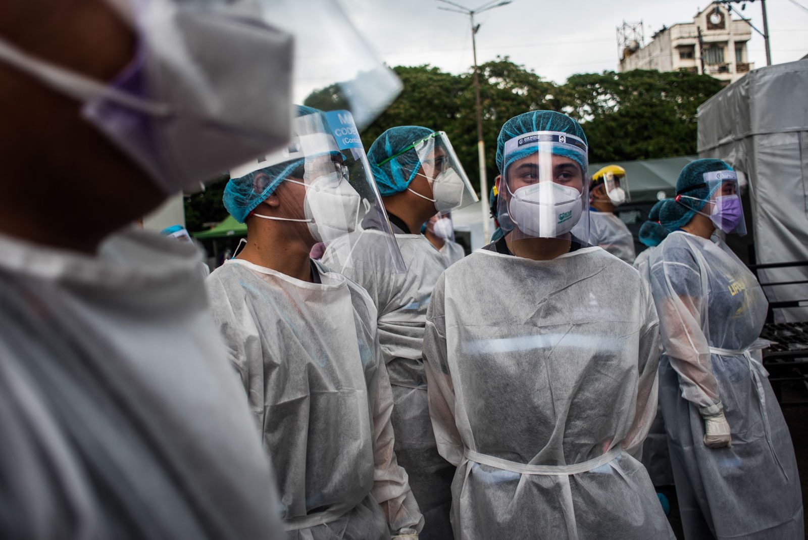 HIGH RISK. Health workers gather before starting to test suspected COVID-19 patients in Sta Ana Hospital in Manila on April 17, 2020. Photo by Lisa Marie David/Rappler 