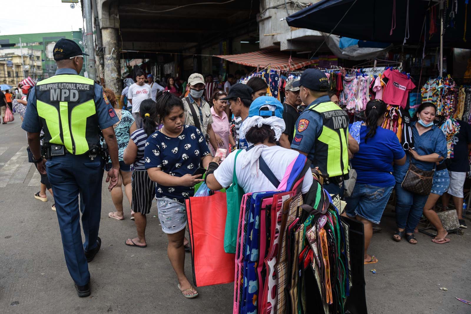 For Manila’s vendors, cleared roads mean empty stomachs