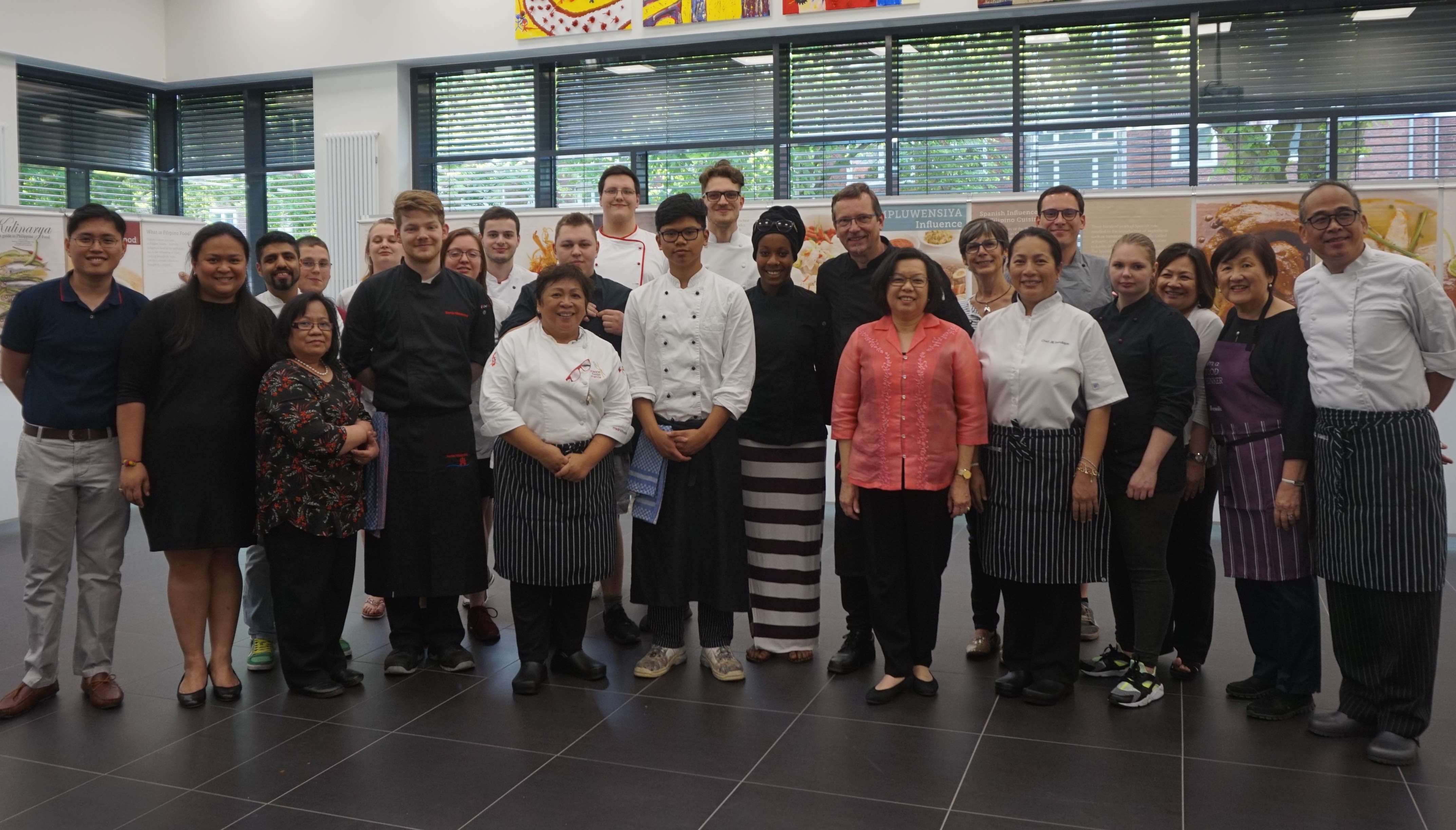 TEAM PH. Philippine Ambassador to Berlin Melita Sta Maria-Thomeczek (6th from R), chef Myrna Segismundo (5th from L), Third Secretary and Vice Consul Alvin Malasig (L), Cultural Attaché Mylah Rubio (2nd from L), chef Jill Sandique (5th from R), food writer Michaela Fenix (2nd from R), and chef Raul Ramos (R) with students and faculty of Hotelfachschule Hamburg. 