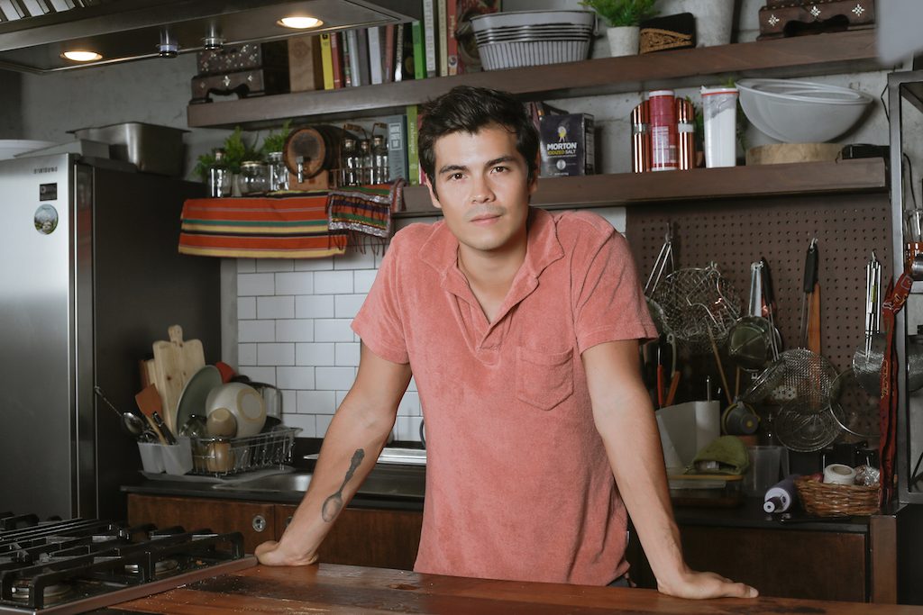 ERWAN'S TURF. Erwan cooks and films content for his blog, The Fat Kid Inside, in his studio kitchen. Photo courtesy of Mundo Design + Build  