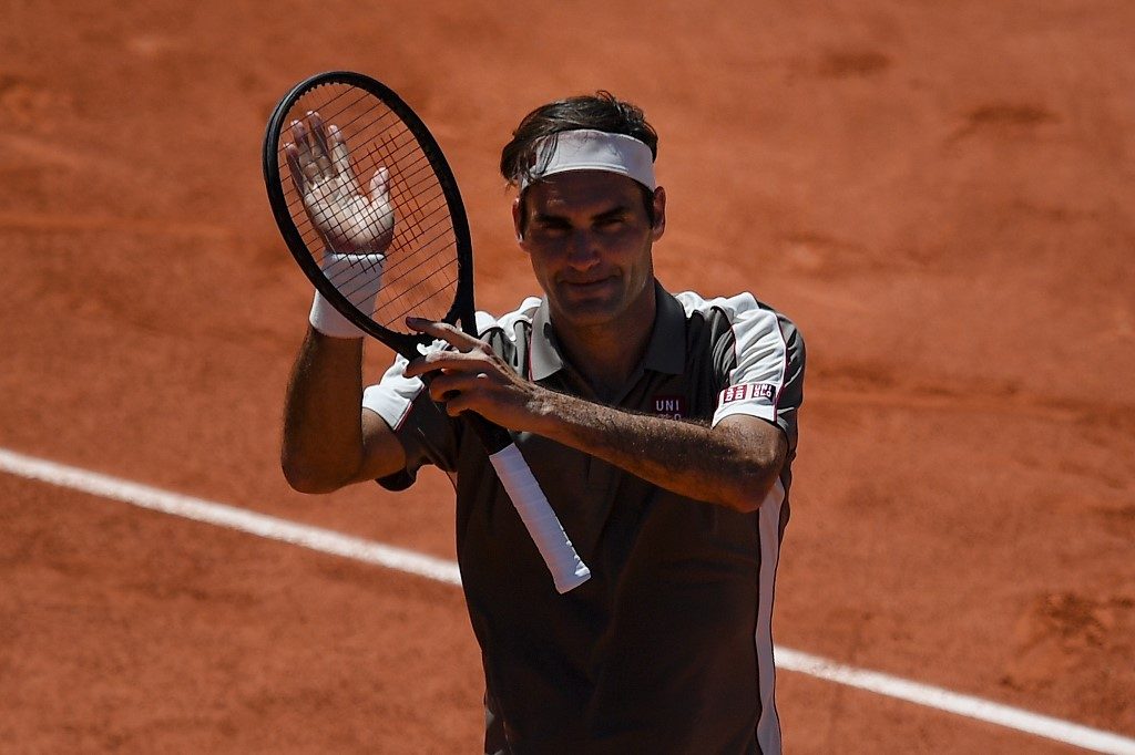 Federer eases into 12th French Open quarterfinal