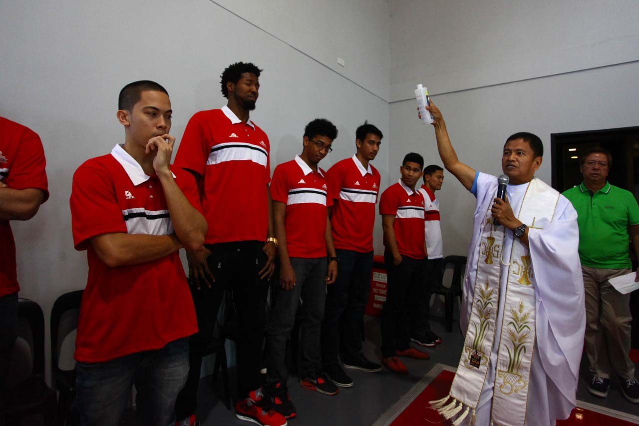 BLESSING. A priest blesses the gym and the players. Photo by Josh Albelda/Rappler 
