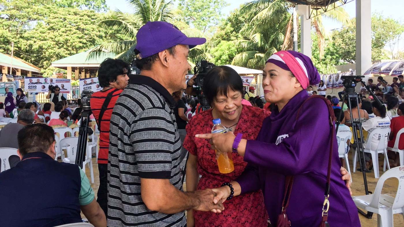 NOT AFRAID. Marawi Civic leader Samira Gutoc with Barangay Taloot Councilor Evangeline Rellin and her husband, Rolando Rellin, the President of Senior Citizens of Argao. Photo by Micole Gerard Tizon/Rappler 