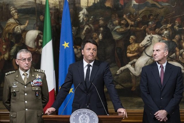 Italian Prime Minister Matteo Renzi (C) speaks next to Defense General Staff Danilo Errico (L) and Head of Police Alessandro Pansa (R), during a press conference about a capsized migrant ship off Italian coast, at Chigi Palace in Rome, Italy, 19 April 2015. Angelo Carconi/EPA 