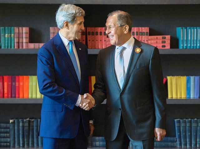 A handout picture released by the Russian Foreign Ministry Press Service of Russian Foreign Minister Sergei Lavrov (R) and US Sercretary of State John Kerry (L) shaking hands prior to their talks in Sochi, Russia, May 12, 2015. Russian MFA Press Service/Handout/EPA 