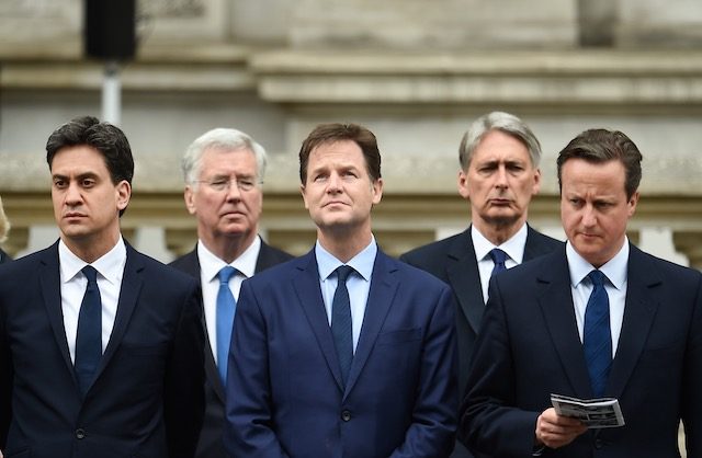 WHAT NOW? British political leaders (L-R) Ed Miliband (Labour), Defence Minister Michael Fallon, Deputy Prime Minister Nick Clegg (Liberal Democrats), Foreign Secretary Philip Hammond, and British Prime Minister David Cameron (Conservative), at the Cenotaph for the VE70 Commemorations in Whitehall, central London, England, May 8, 2015. Andy Rain/EPA 