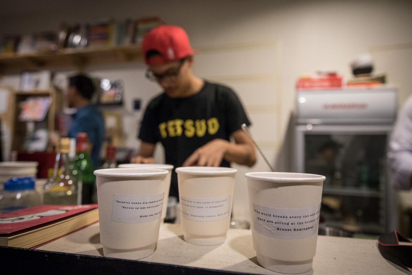 BOOKS AND BOOZE. YDG Coffee's Matt Carpio mixes drinks inspired by literary works such as Ricky Lee's 'Para Kay B' and Allen Ginsberg's 'Howl.' 
