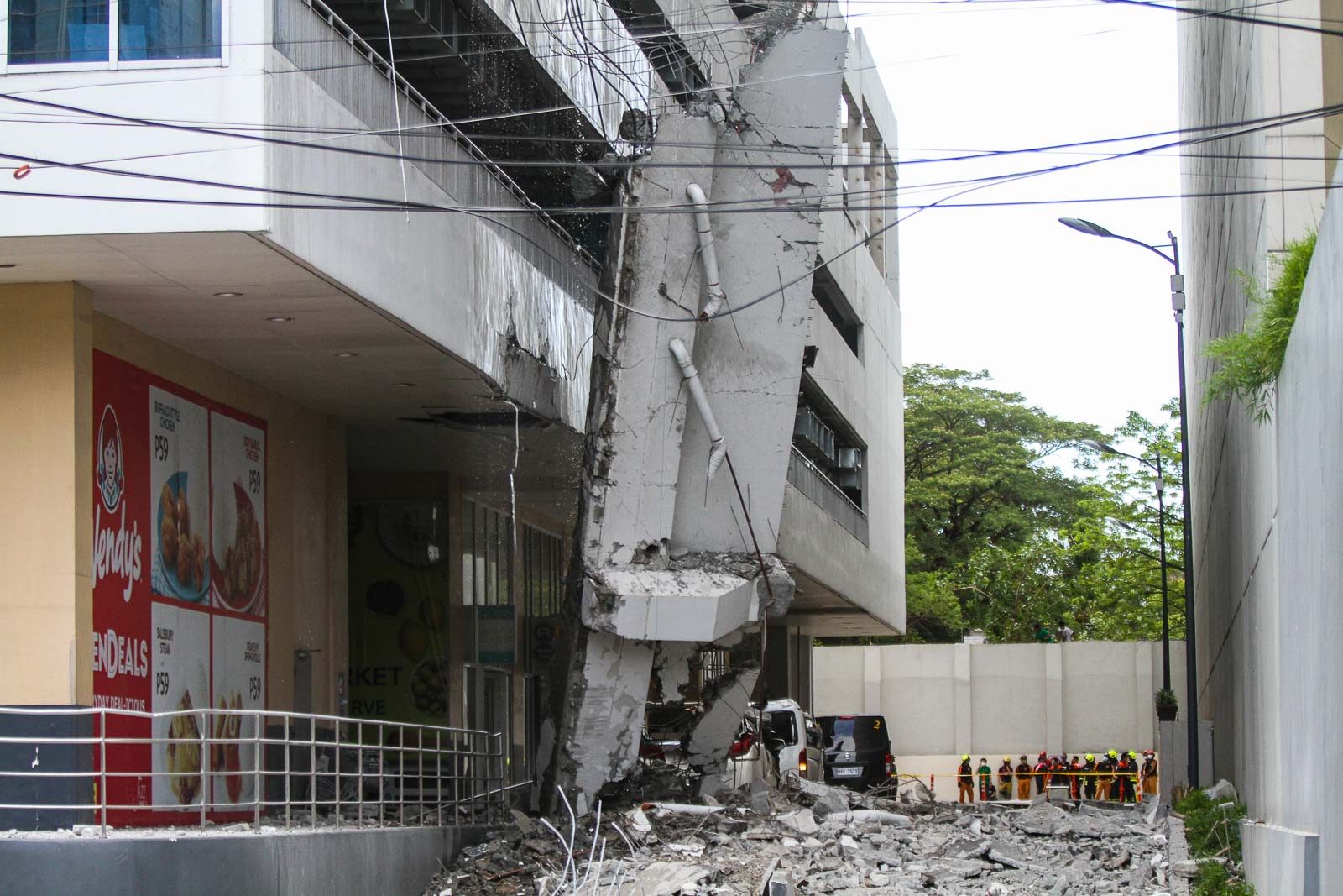 LOOK: Portion of Makati mall parking building collapses