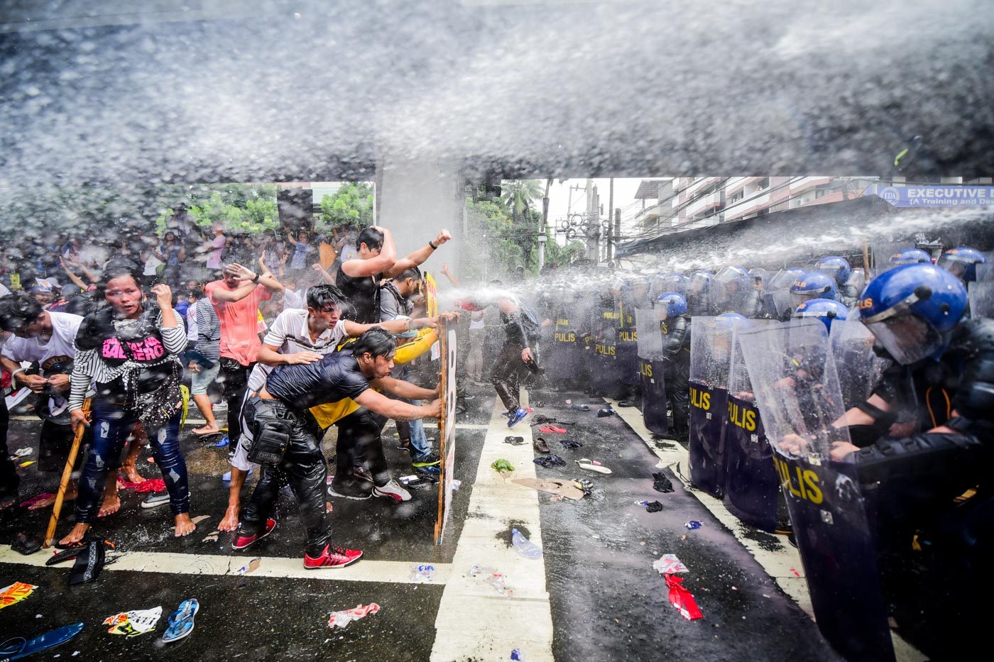 REPEL. To repel protesters, police use water cannons and sonic alarm. 