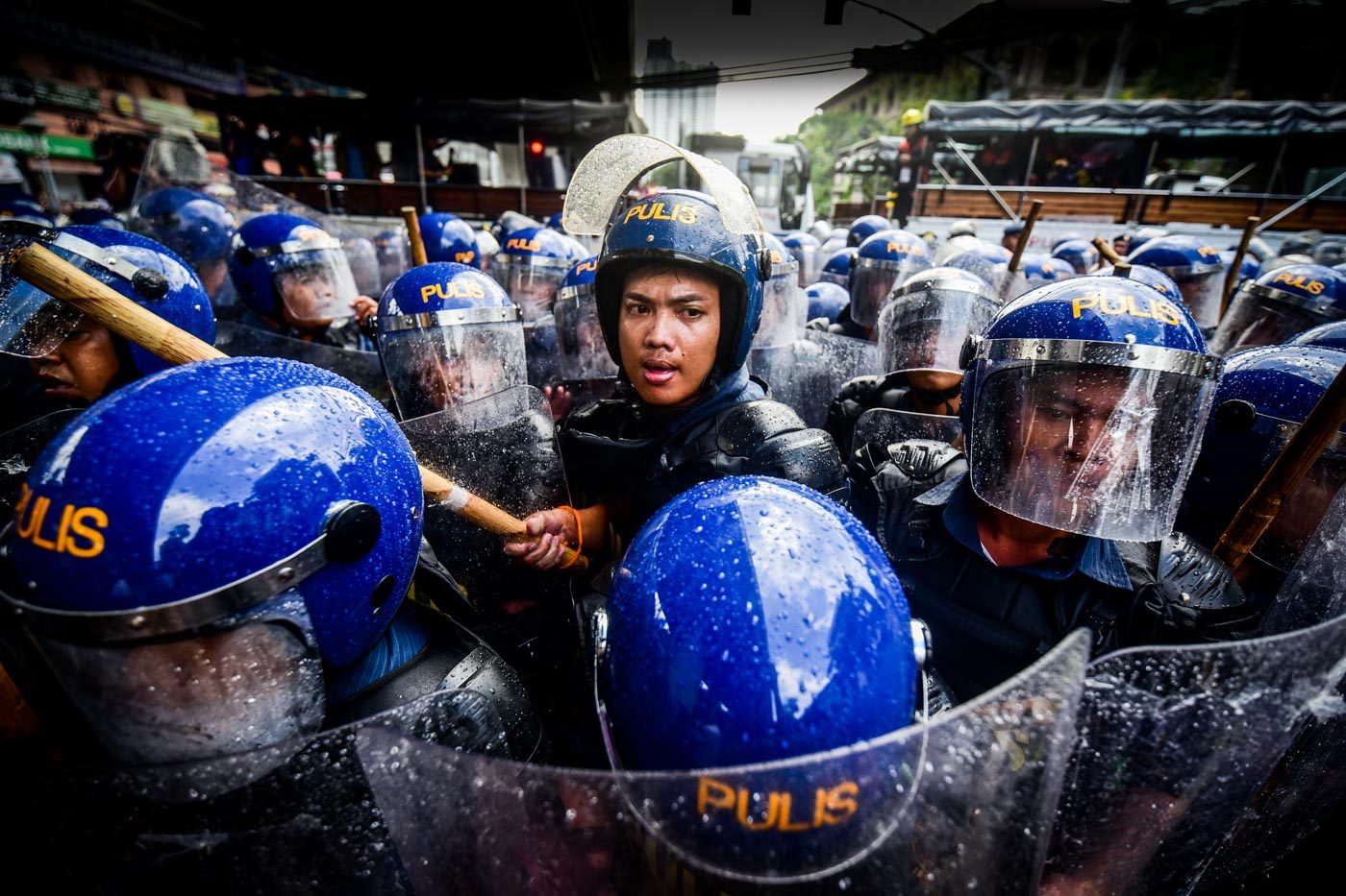 SECURITY. Around a hundred anti-riot police respond to the protest action along Taft Avenue on Monday, November 13. 