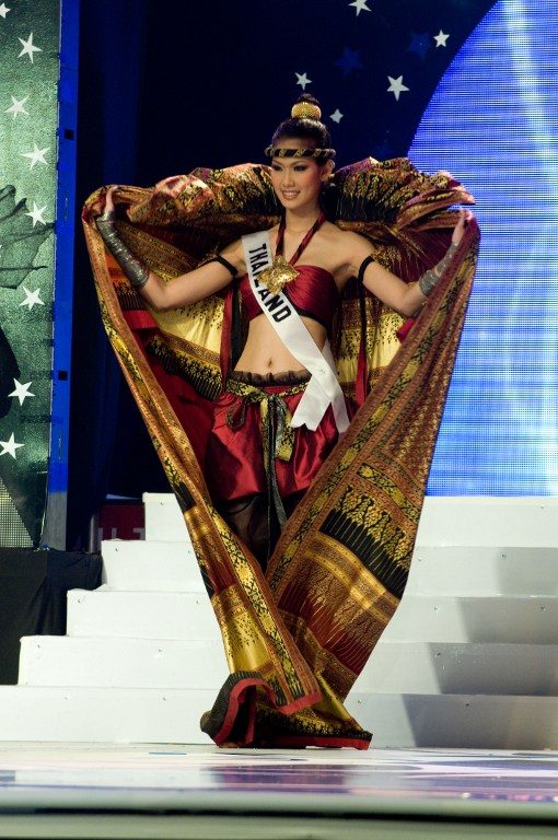 2008 – MUAY THAI INSPIRED.  Gavintra Photijak, Miss Thailand 2008, competes in her National Costume at the Lions Theater in Ho Chi Minh City on June 22, 2008. Miss Venezuela Dayana Mendoza, 22, won the Miss Universe pageant. Photo by Darren Decker/AFP Photo/HO/Miss Universe 