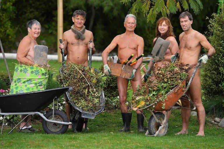 GOING GREEN. Nude participants pose for a group photo as they celebrate World Naked Gardening Day at the Wellington Naturist Club in Wellington, New Zealand on May 5, 2018. Photo by Marty Melville/AFP   