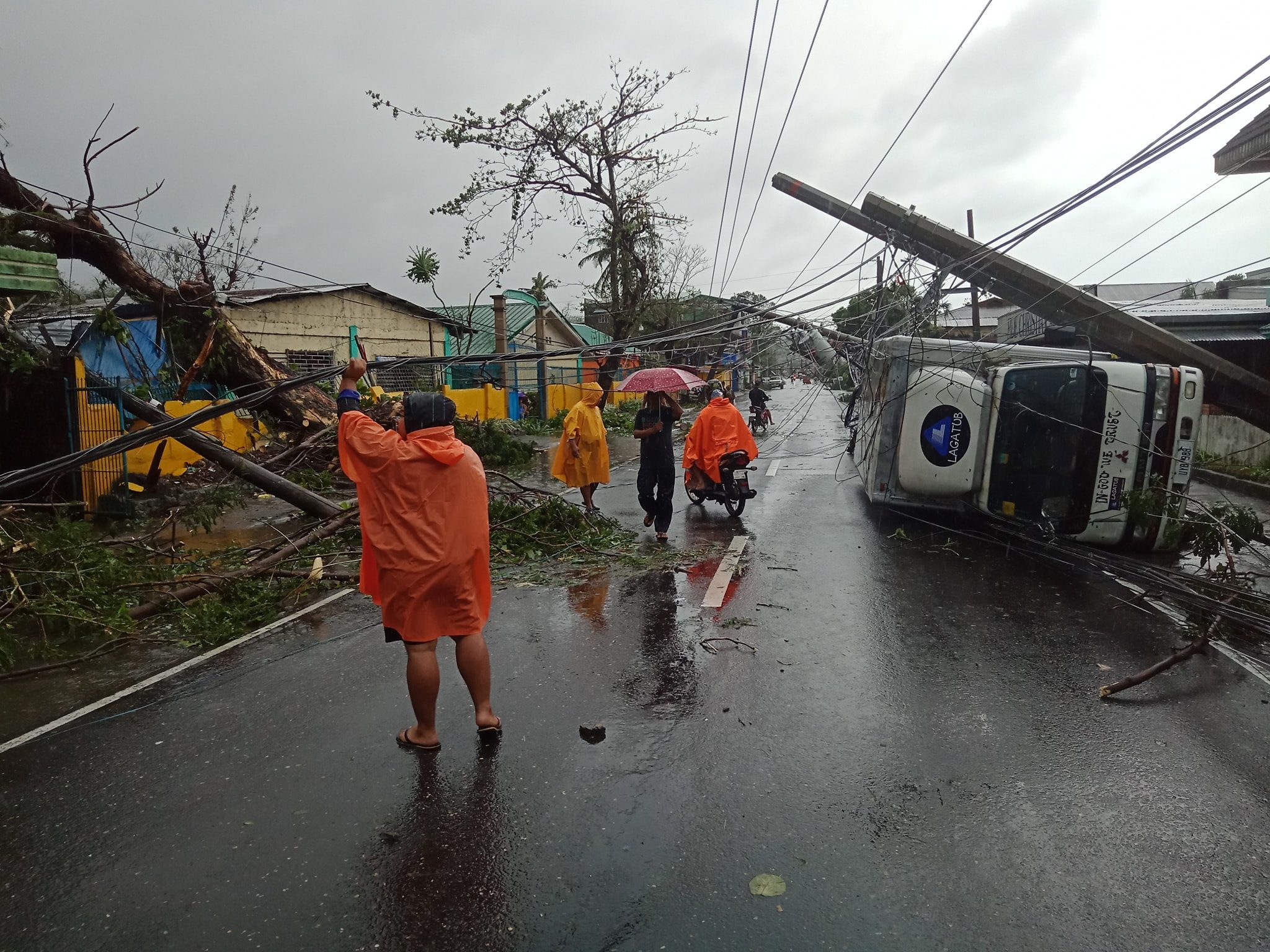 IN PHOTOS: Typhoon Tisoy leaves trail of destruction across Bicol